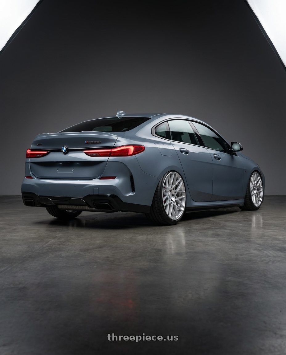 2021 BMW M235i xDrive, Storm Bay Metallic with Rotiform 1PC R110 BLQ 5X112 19X8.5 +35 GLOSS SILVER MACHINED wheels rear three quarter view extreme stretch tires