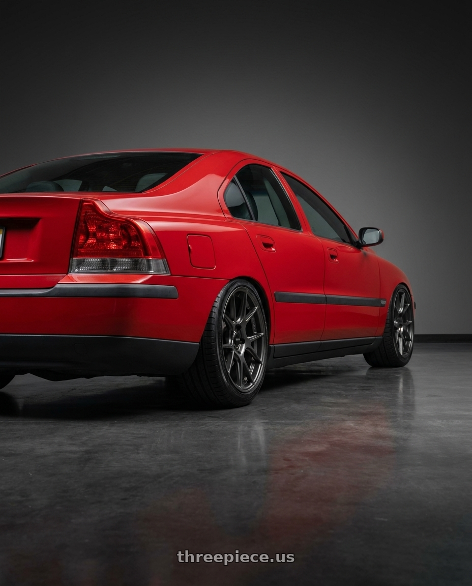 2002 Volvo s60 2.4t with Konig Ampliform 5x108 18x8.5+43 Dark Metallic Graphite wheels rear three quarter view slight stretch tires