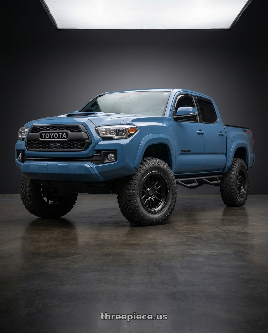 2019 Toyota Tacoma TRD Sport with LOCK OFFROAD KRAWLER 6x139.7 17x9 -12 Matte Black W Matte Black Ring wheels front three quarter view lifted stance