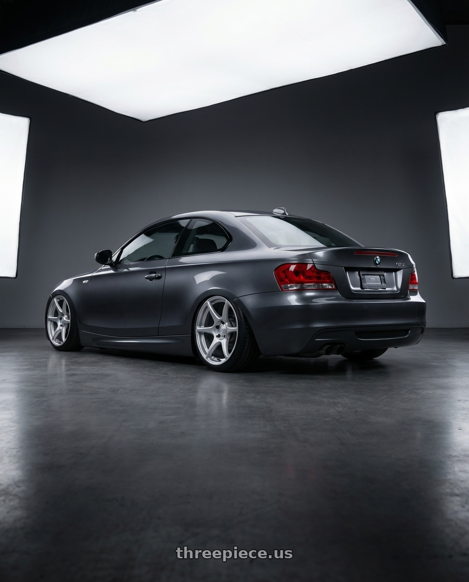 2012 BMW 1 Series E82 with Kansei K11S Tandem 5X120 19x10.5 22 Hyper Silver wheels rear three quarter view slight stretch tires