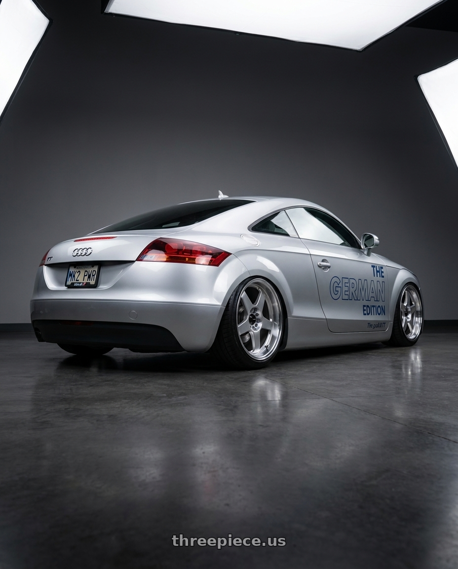 2008 Audi tt with Vors SP1 5x105 18x8  +35 Silver Machine Face Lip wheels rear three quarter view slight stretch tires