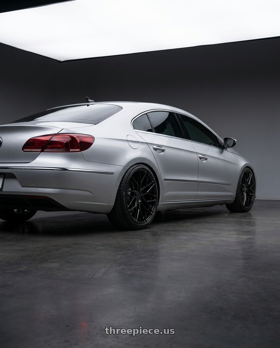 2015 Volkswagen CC with Avant Garde Wheels M520R 5X112 19x8.5 +35 Gloss Black wheels rear three quarter view square tires