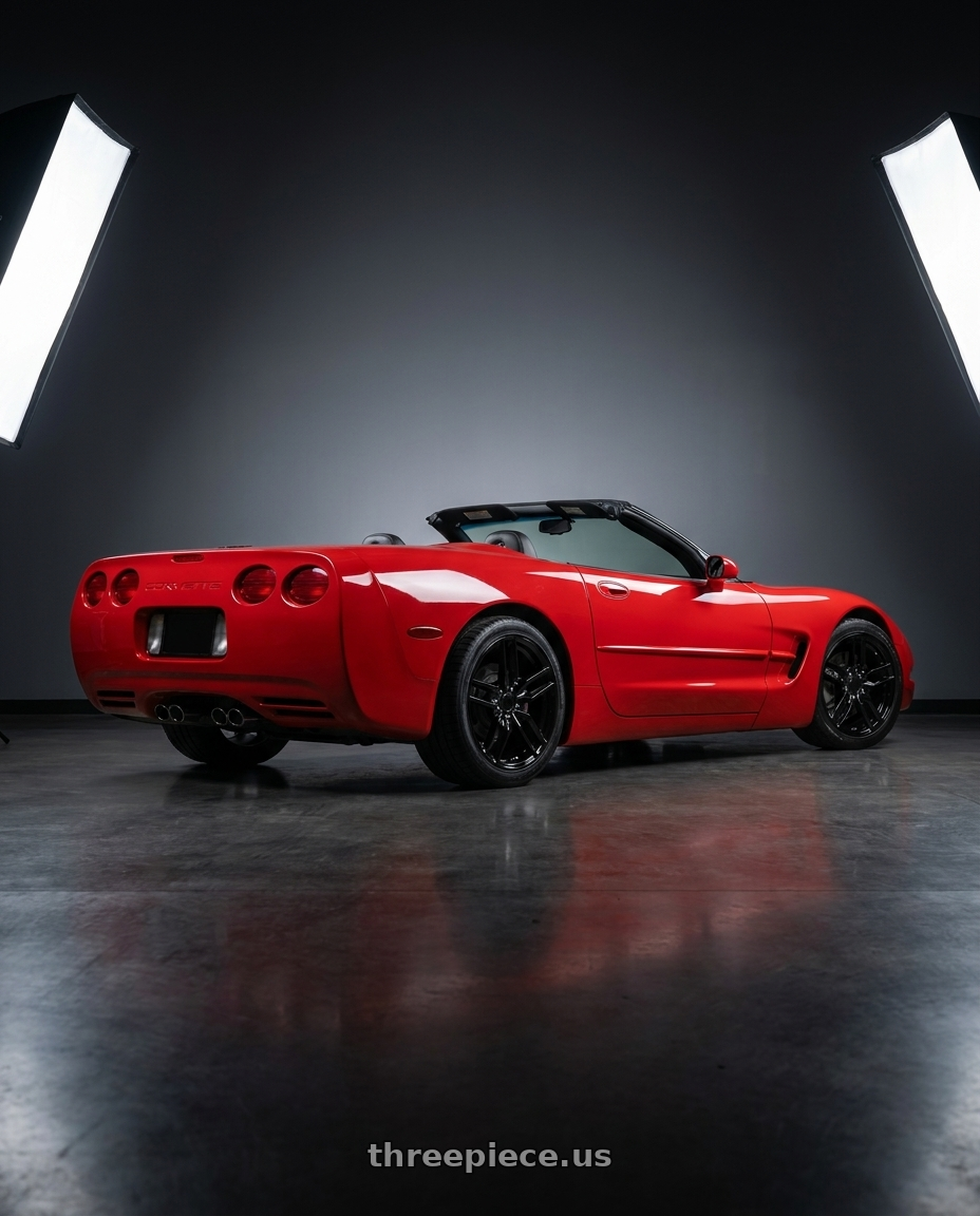 2000 Chevy Corvette with Performance Replicas PR160 5X120.65 18X8.5 +56 GLOSS BLACK wheels rear three quarter view square tires