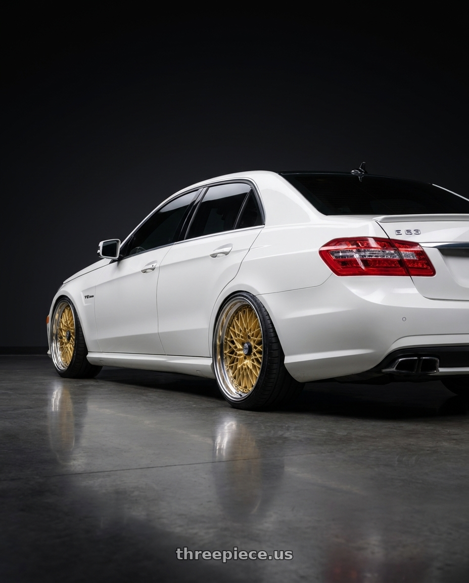 2012 Mercedes-Benz E63 AMG with SSR Formula MESH 5x112 19X12+24 SL Disk Fm Gold wheels rear three quarter view extreme stretch tires