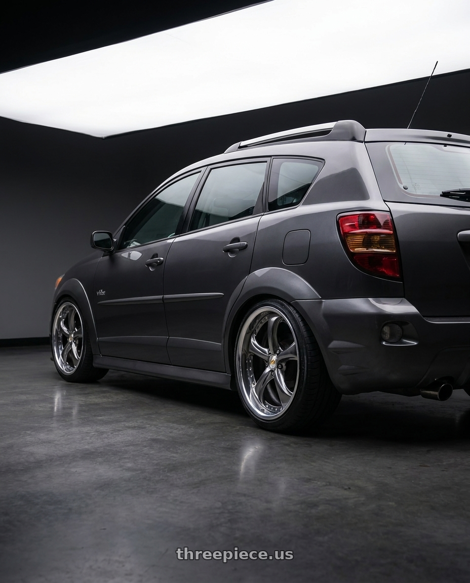 2004 Pontiac Vibe with Work Wheels VS-KF 5X114.3 19x7.5+27 Brilliant Silver Black O Disk FULL REVERSE wheels rear three quarter view slight stretch tires