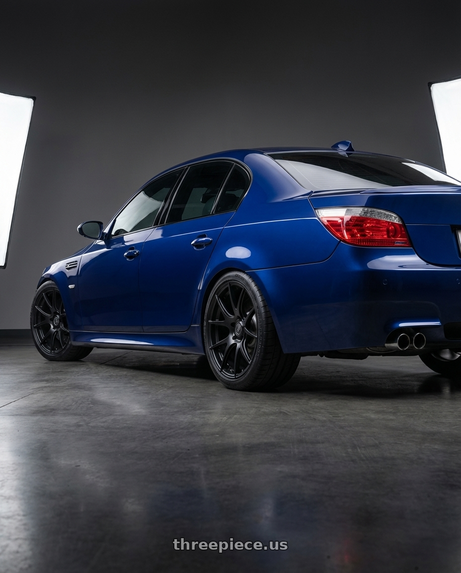 2010 BMW M5 E60 with Forgestar CF5V 5x120 19x9 +38 Satin Black wheels rear three quarter view square tires