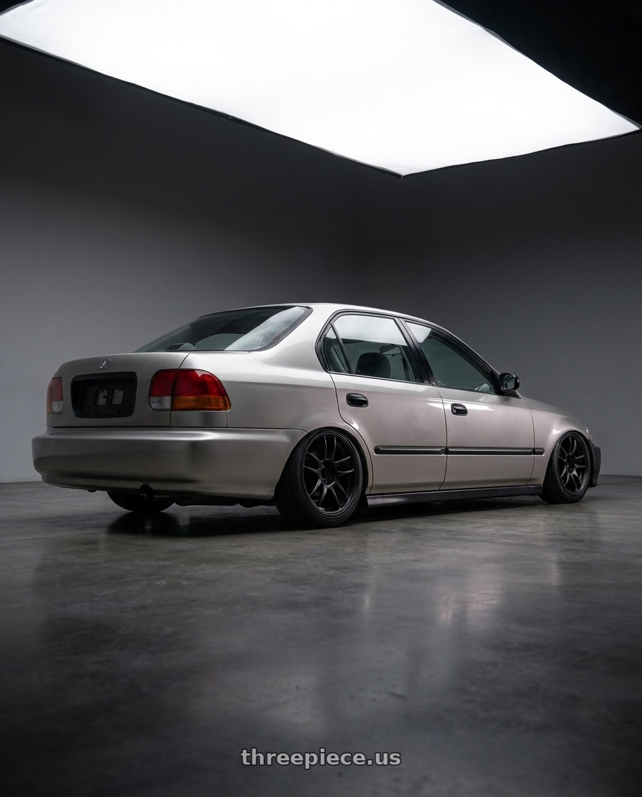 2000 honda civic sedan dx with Work Emotion Cr Kiwami 4x100 16x6.5 +42 Matte Black wheels rear three quarter view slight stretch tires