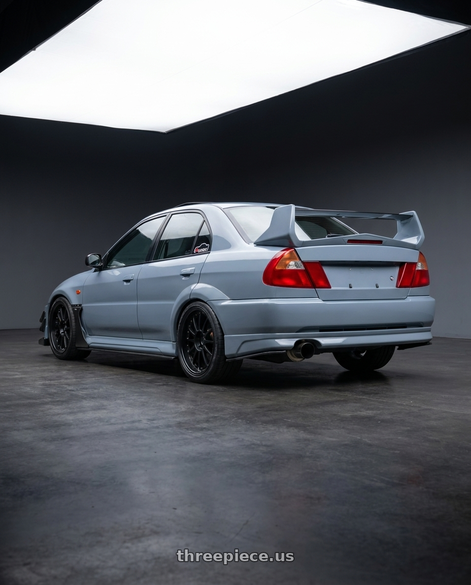 1999 Mitsubishi lancer Evolution 5 with SSR Professor TF1 5x114.3 19X10.5+0 HP Disk Flat Black wheels rear three quarter view slight stretch tires