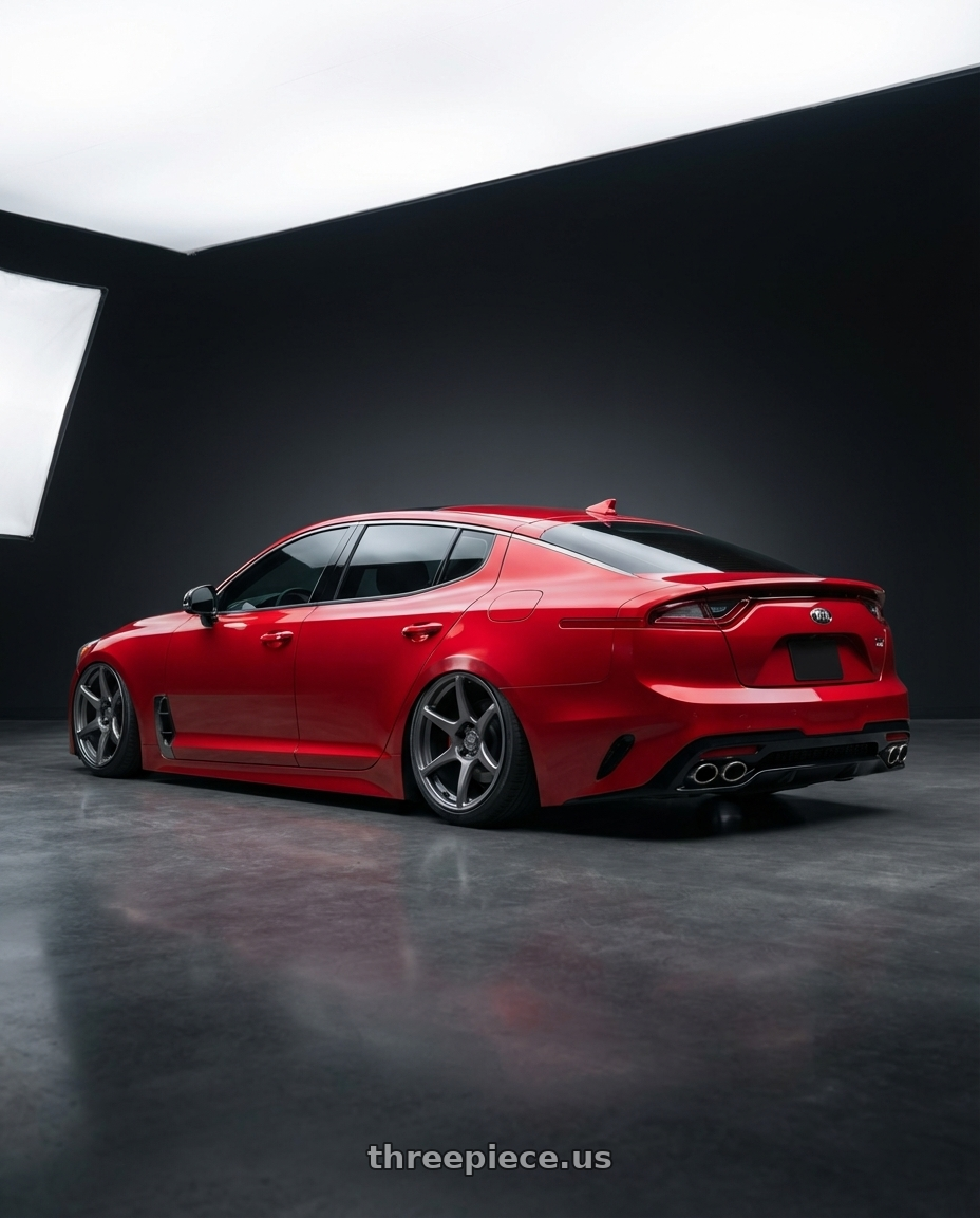 2022 Kia Stinger GT with Kansei K11G Tandem 5x114.3 19x10.5 12 Gunmetal wheels rear three quarter view slight stretch tires