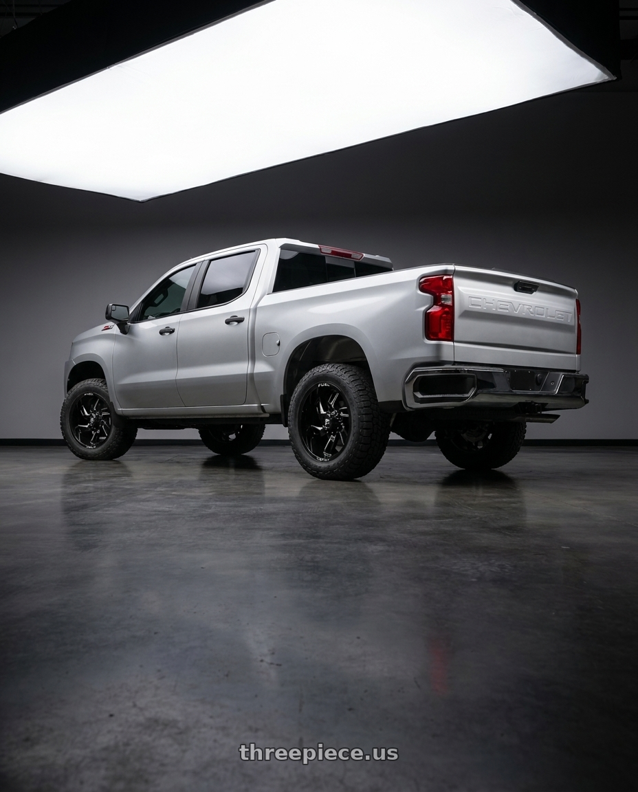 2026 Chevrolet Silverado 1500 with Fuel 1PC D747 LOCKDOWN 6X135 20X10 -18 GLOSS BLACK MILLED wheels rear three quarter view square tires