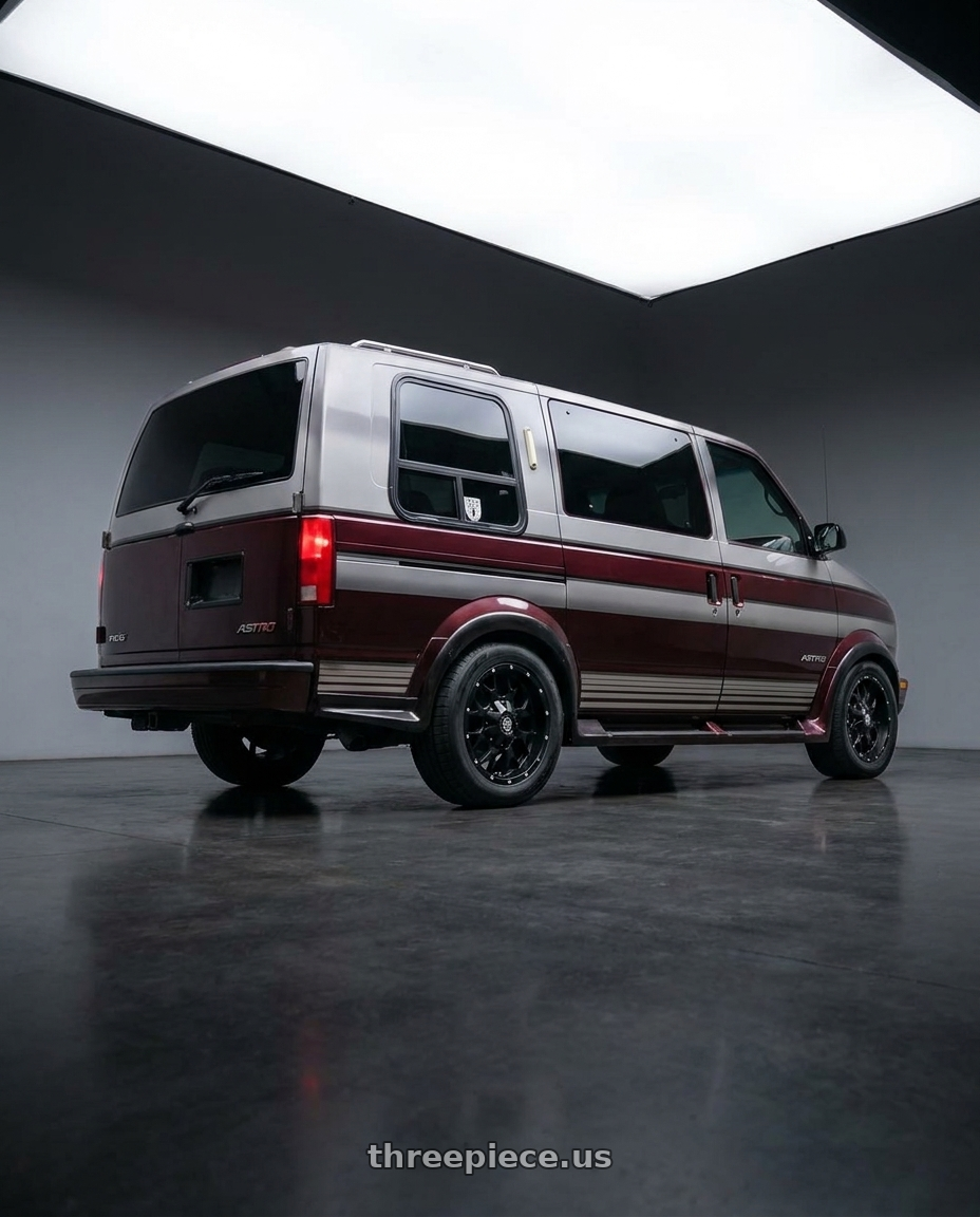 1996 chevy ASTRO van with Mayhem Warrior 8015 8x165.1/8x170 17x9+18 Matte Black wheels rear three quarter view square tires