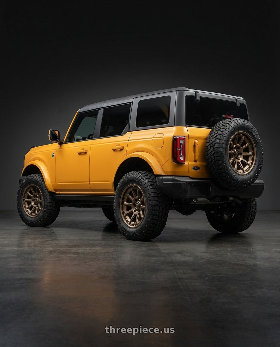 2024 Ford Bronco with Fuel 1PC D690 TORQUE 6X139.7 17X9 -12 MATTE BRONZE wheels rear three quarter view meaty tires