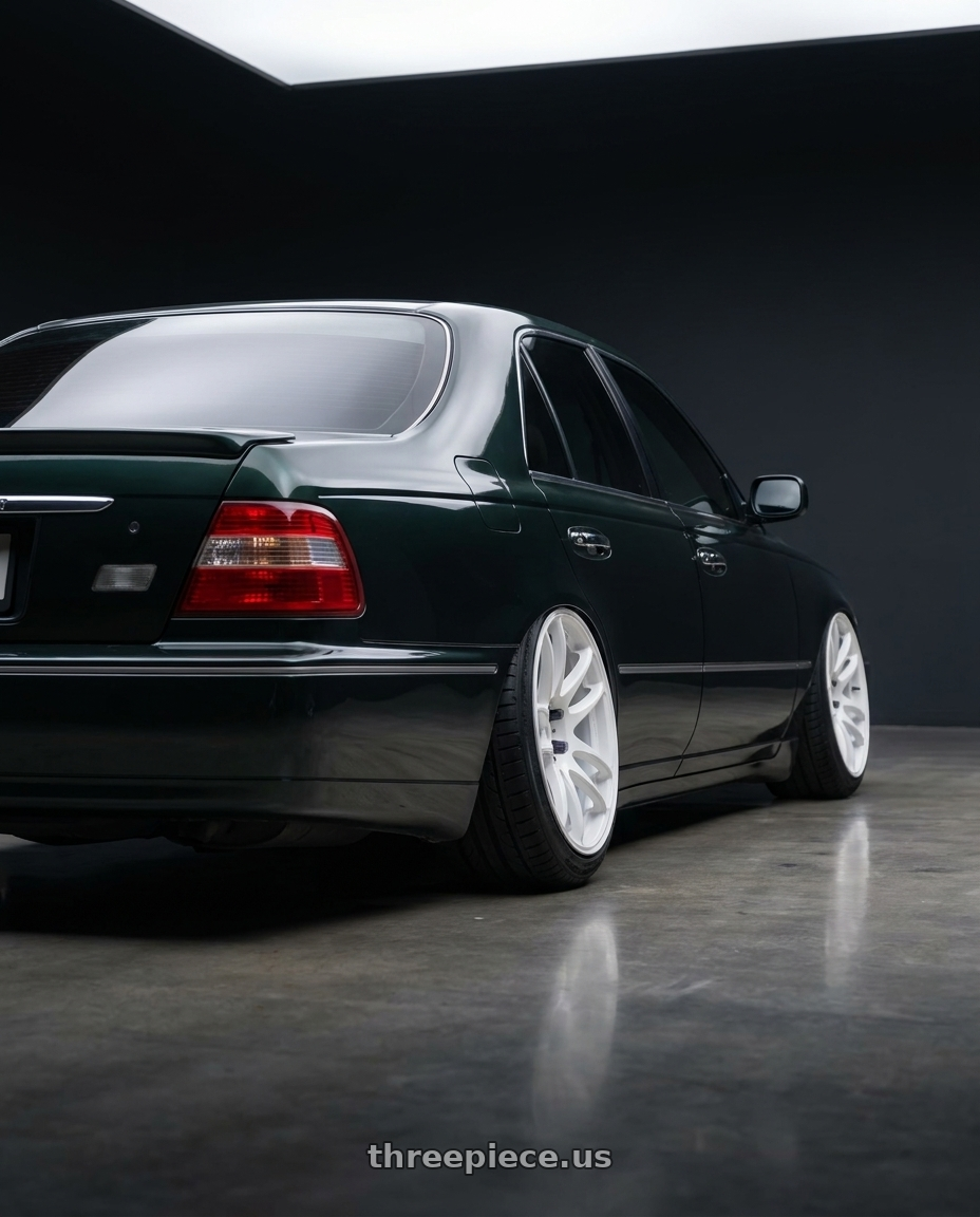 2000 Infiniti Q45 with Work Emotion Cr Kiwami 5x100 18x9.5 +0 White wheels rear three quarter view meaty tires