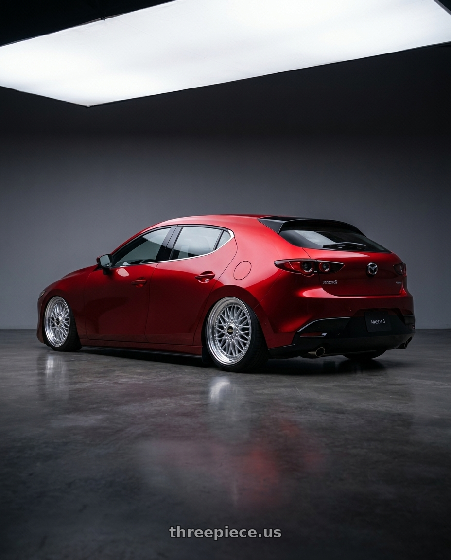 2024 Mazda 3 with BBS Super-RS 5x112 19x9.0+42 Silver wheels rear three quarter view slight stretch tires