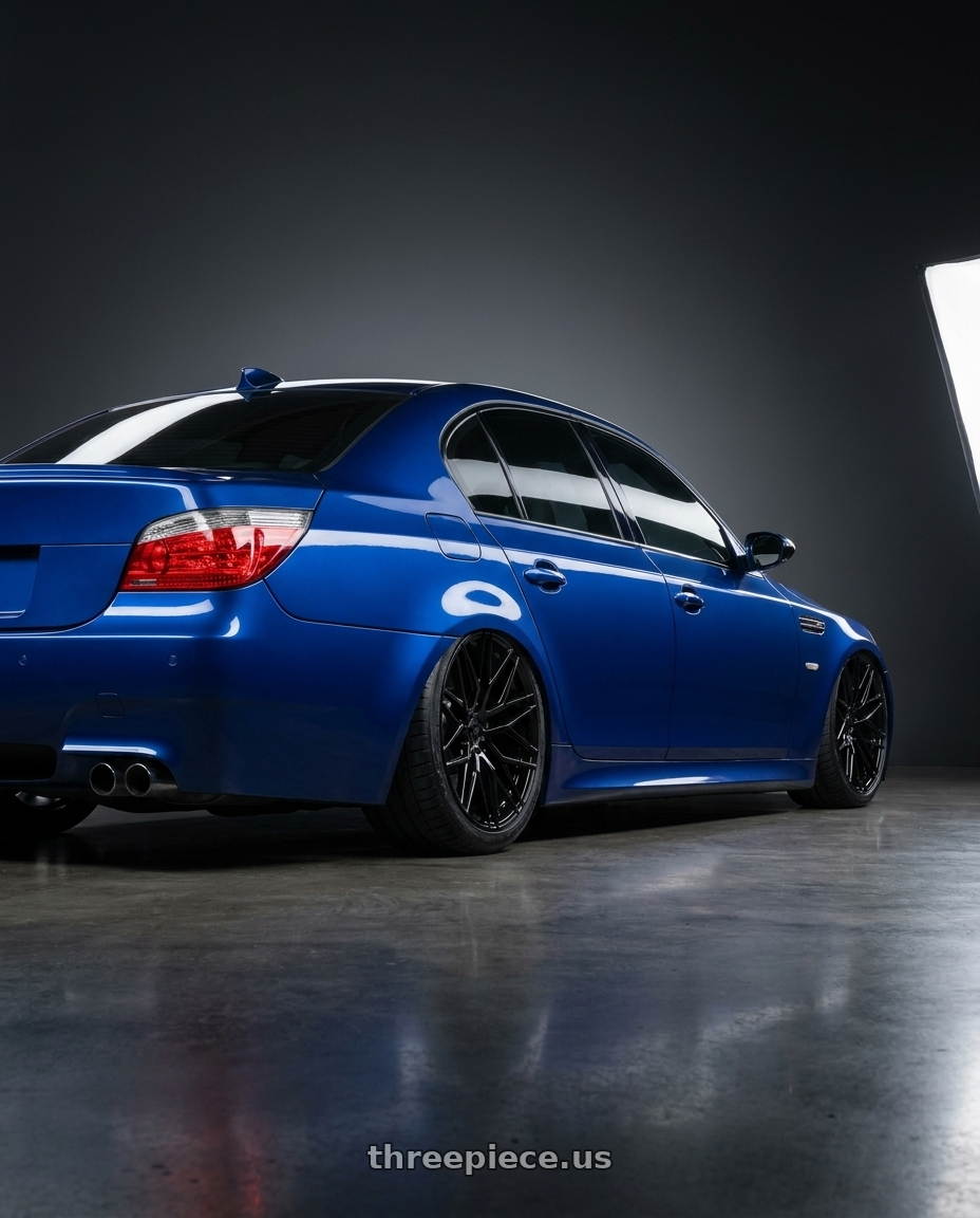 2010 BMW M5 E60 with Avant Garde Wheels M520R 5X120 20x11 +45 Gloss Black wheels rear three quarter view slight stretch tires