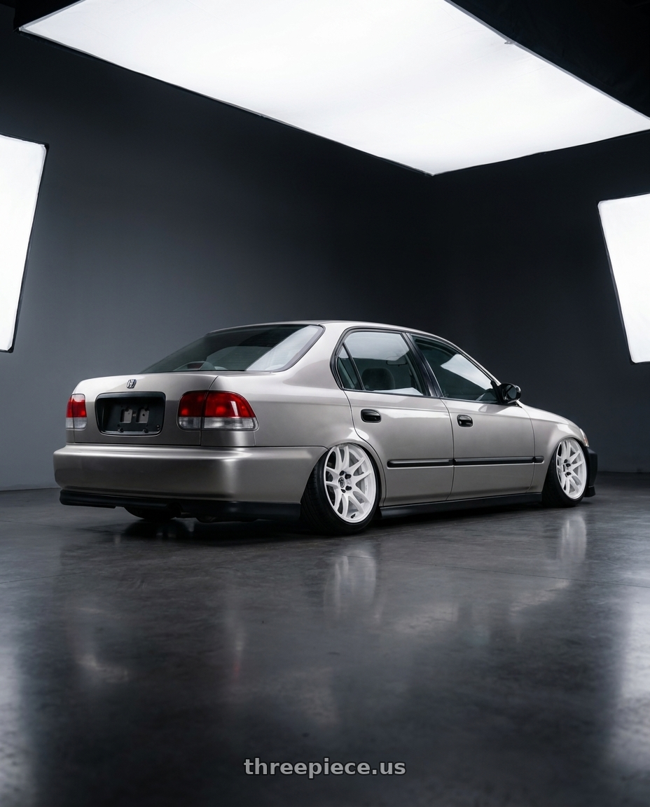 2000 honda civic Dx sedan with Work Emotion Cr Kiwami 4x100 16x6.5 +42 White wheels rear three quarter view slight stretch tires