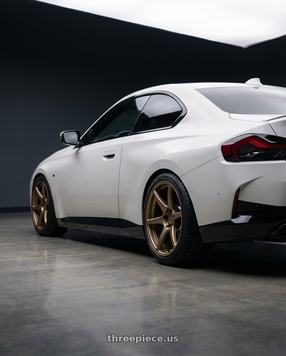 2024 BMW 2 Series G42 with Kansei K11B Tandem 5X112 19x9.5 22 Bronze wheels rear three quarter view square tires