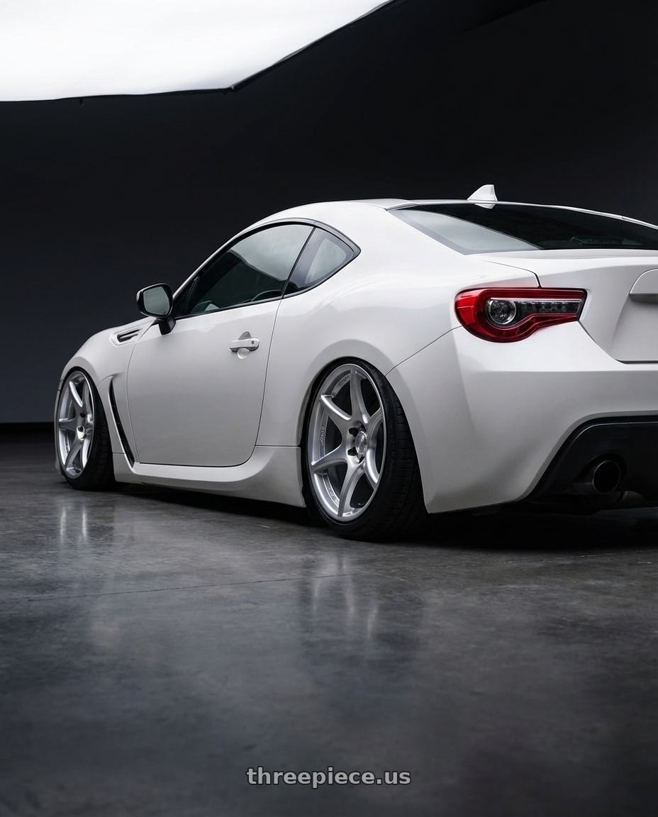 2016 Scion FR-S with Kansei K11S Tandem 5X100 18x9.5 22 Hyper Silver wheels rear three quarter view slight stretch tires