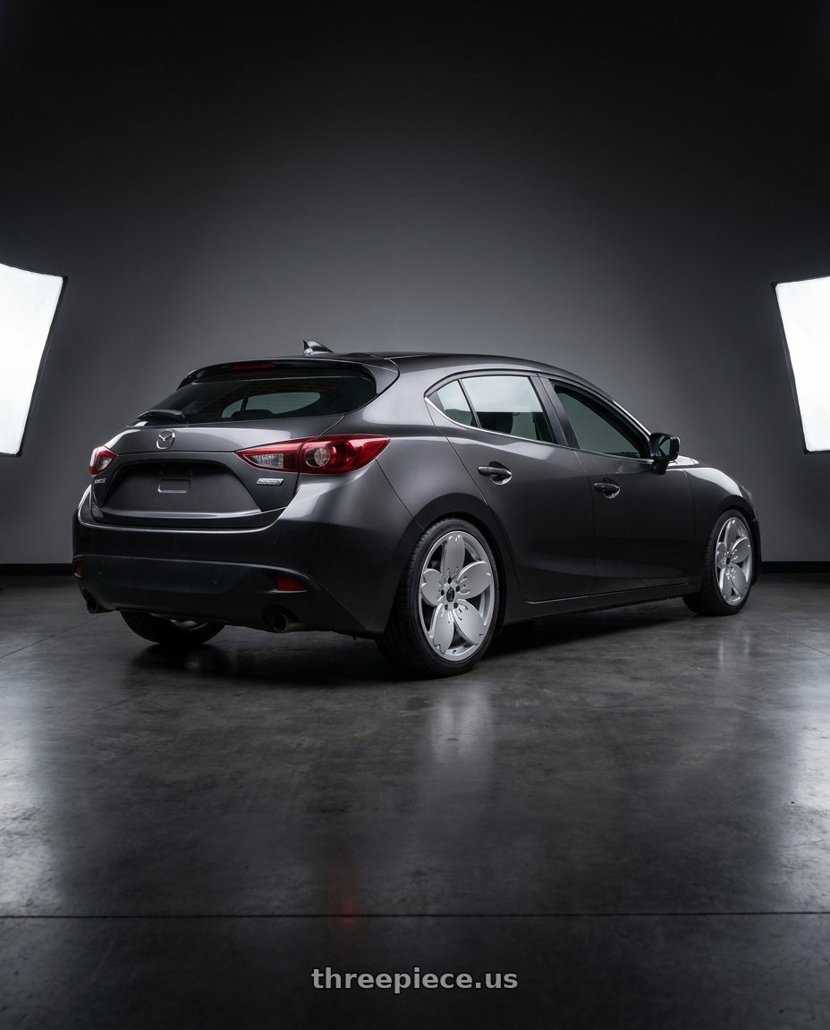 2016 Mazda 3 with Heritage Wheel Sakura MonoC 5X115 18x9.5+22 Silver wheels rear three quarter view square tires