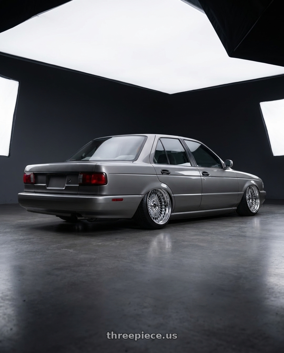 1994 Nissan Sentra b13 with Work Emitz wheels rear three quarter view extreme stretch tires