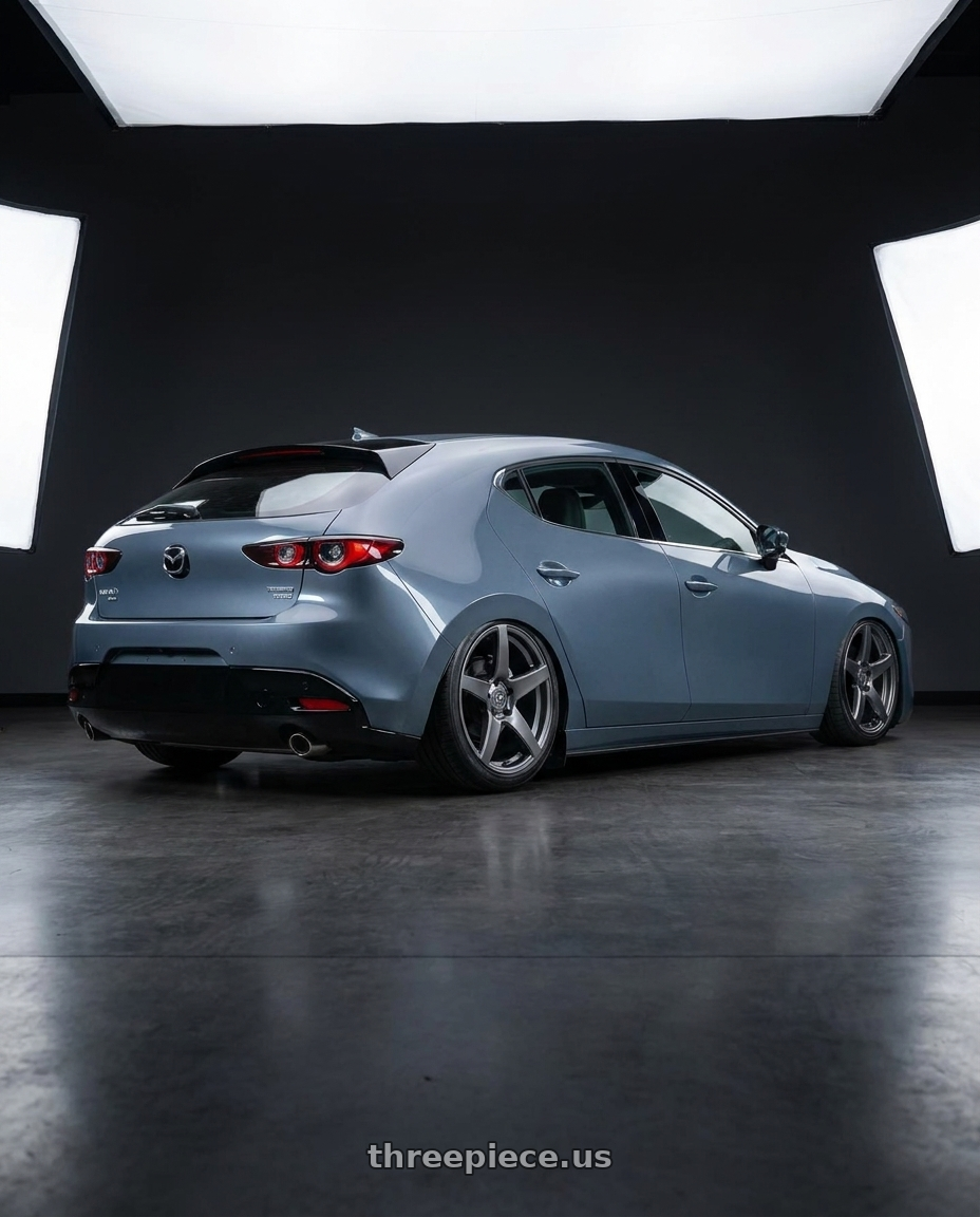 2023 Mazda Mazda3 Turbo with Forgestar CF5 5x114.3 18x9 +35 Gloss Anthracite wheels rear three quarter view slight stretch tires