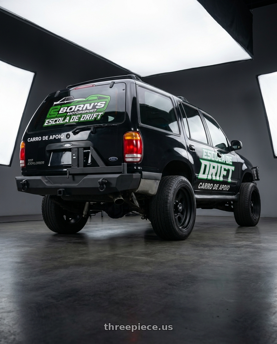 FORD EXPLORER 1998 ADESIVADA with Mickey Thompson Classic III Black 5x139.7 17x9 -12 Matte Black wheels rear three quarter view extreme stretch tires