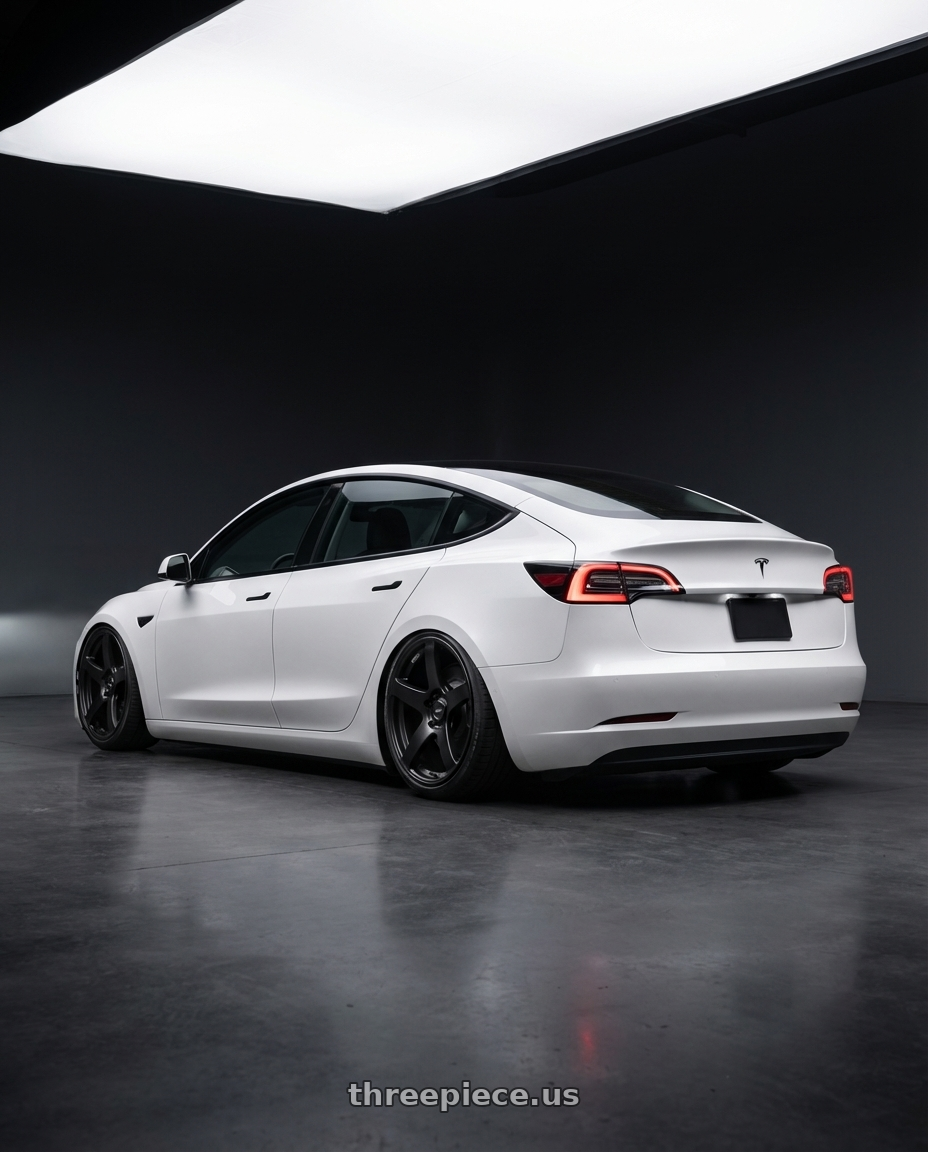 2023 Tesla Model 3 with Ssr Gtv01 5x114.3 19x8.5+38  FLAT BLACK wheels rear three quarter view slight stretch tires