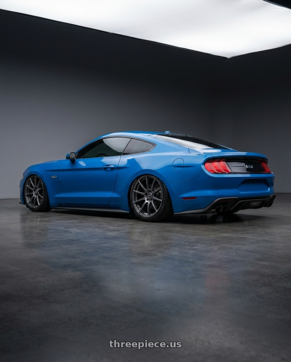 2022 Ford Mustang GT with Forgestar CF10 5x114.3 20x9.5 +29 Gloss Anthracite wheels rear three quarter view slight stretch tires