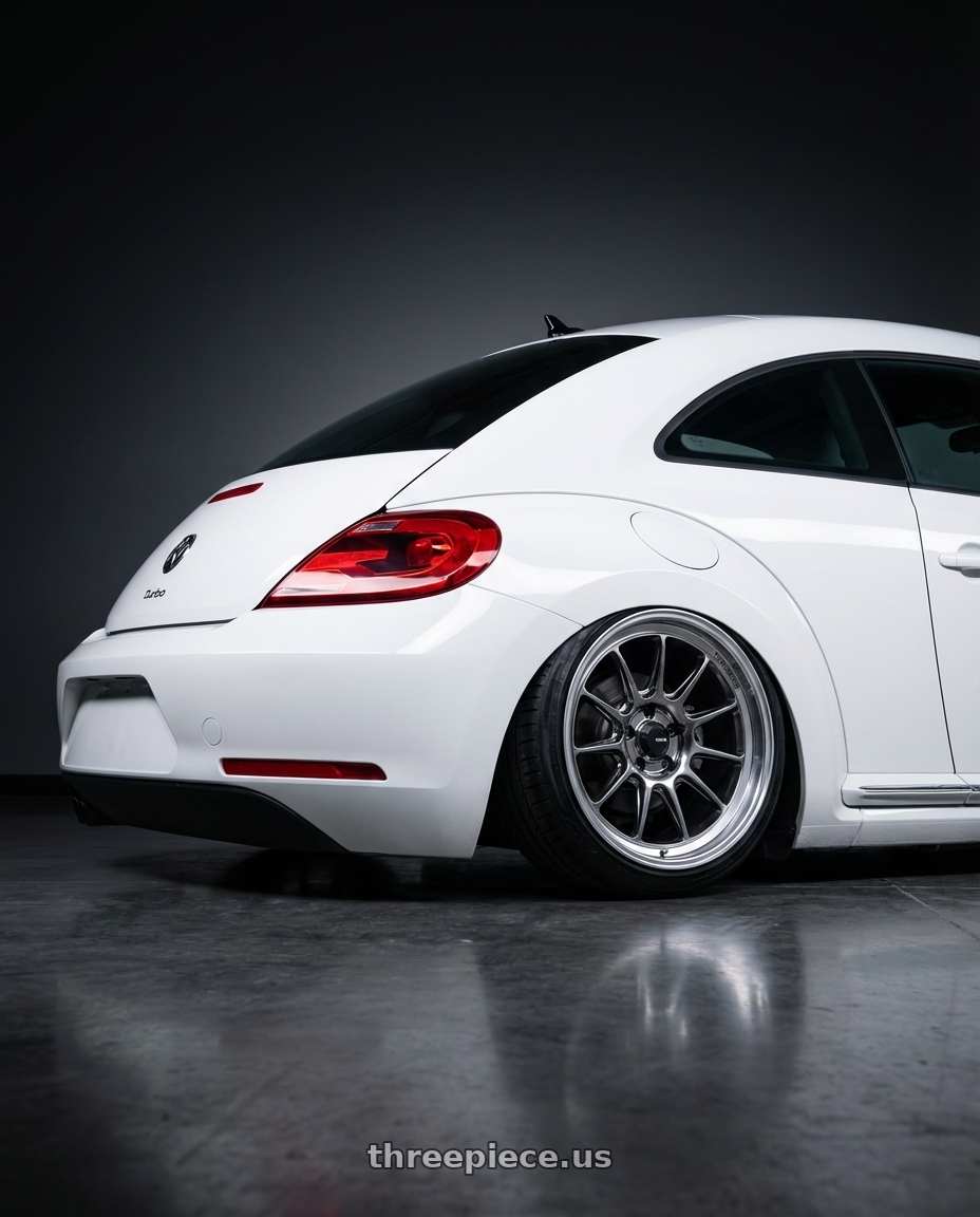 2016 Volkswagen Beetle Turbo with Konig Countergram 5x112 19x8.5+43 Hyper Chrome / Machined Lip wheels rear three quarter view slight stretch tires