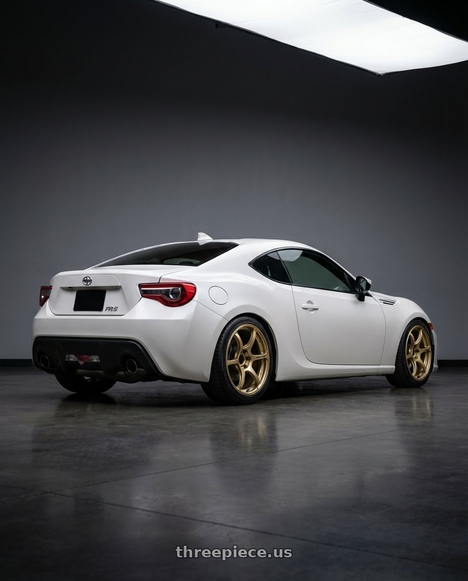 2016 Scion FR-S with Advan RGIII 5x100 17x8.0+48 Gold wheels rear three quarter view square tires
