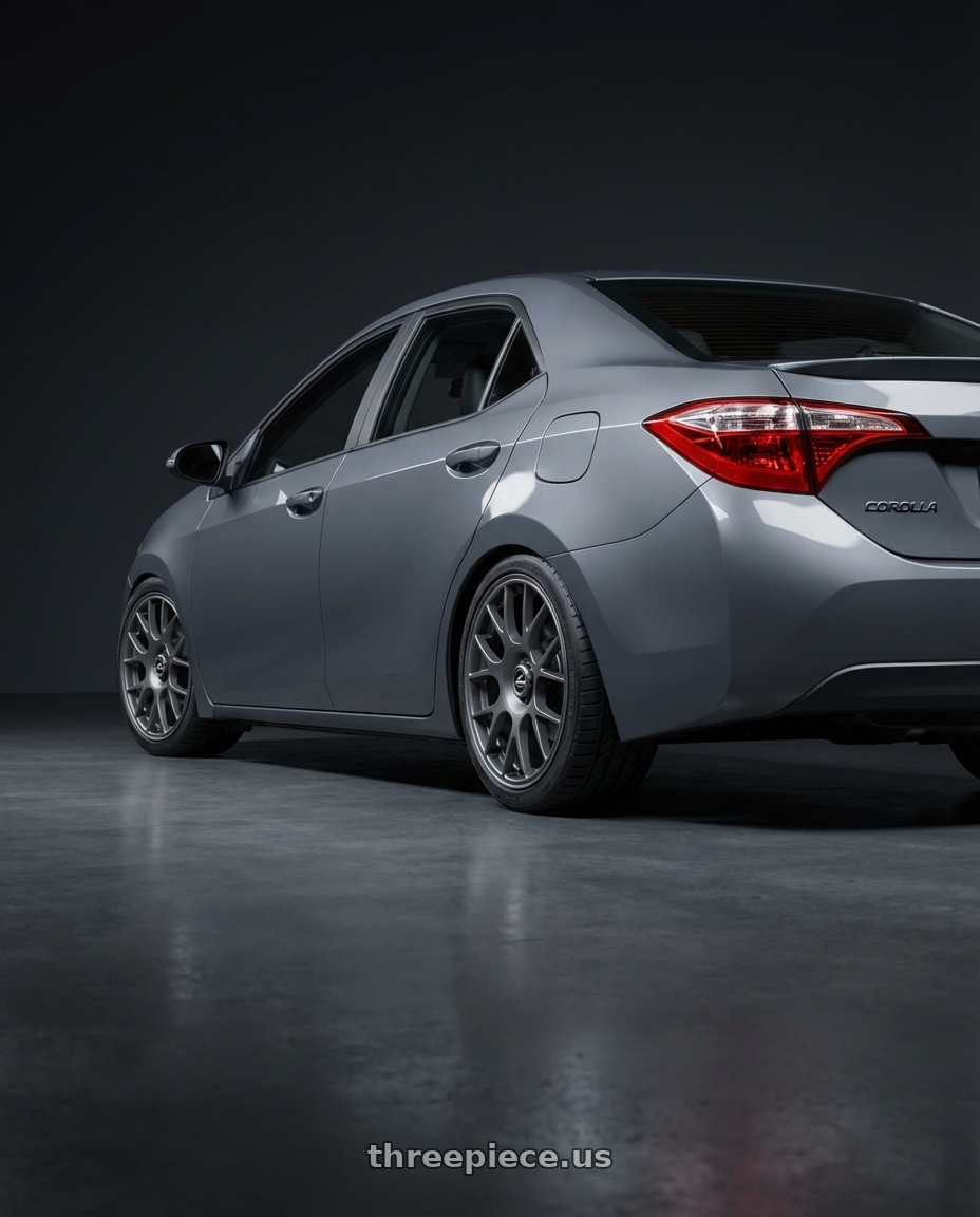 2016 Toyota Corolla S with fifteen52 APEX 5x112 / 5x120 18x8.5 +35 FROSTED GRAPHITE (SATIN GREY) wheels rear three quarter view square tires