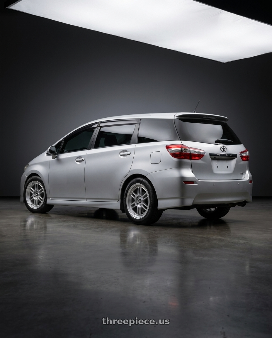 2009 Toyota wish with Enkei RPF1 4x100 15x7+35 Silver wheels rear three quarter view square tires