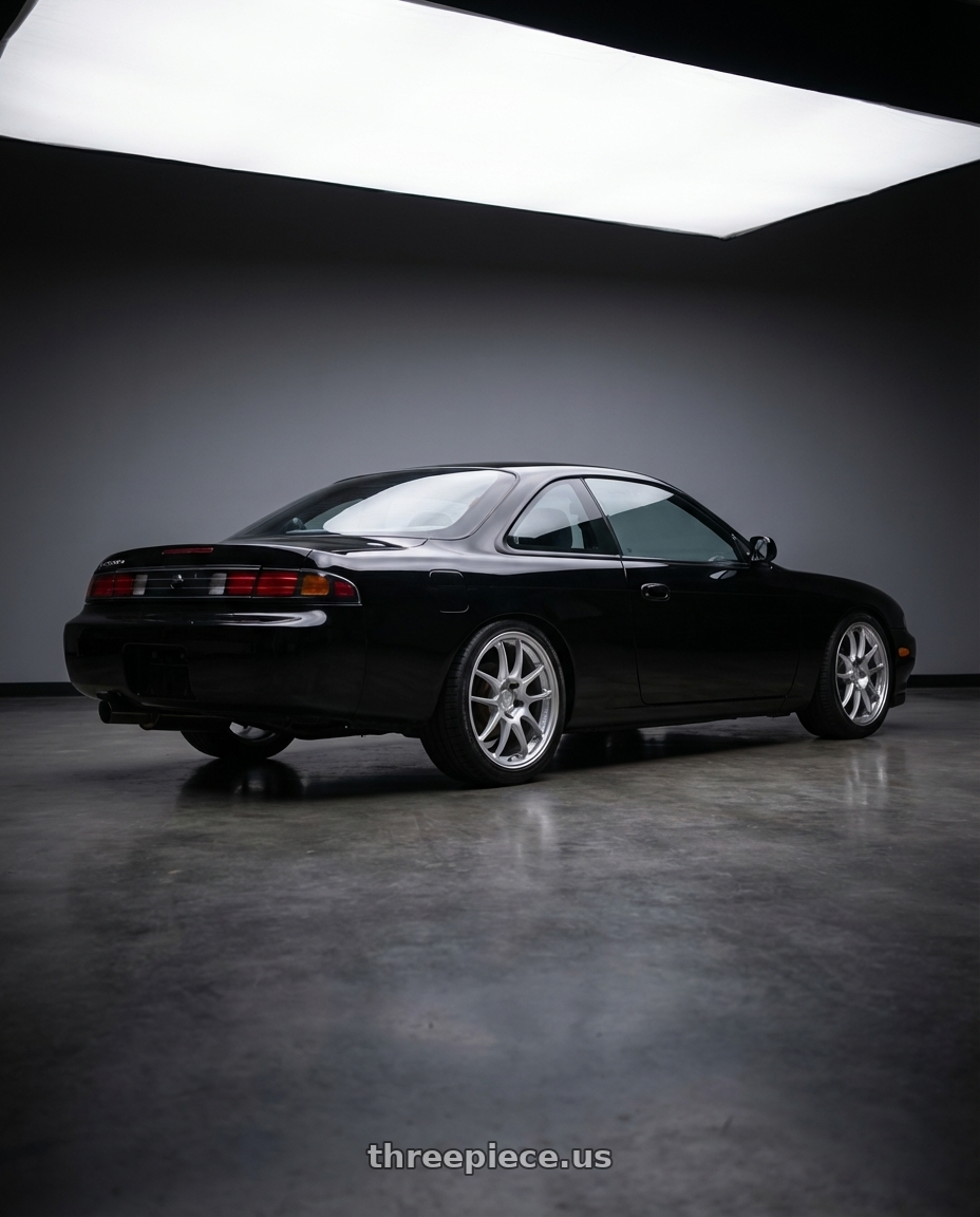 1997 Nissan 240sx  with Enkei PF01 5x114.3 18x9+35 Silver wheels rear three quarter view square tires