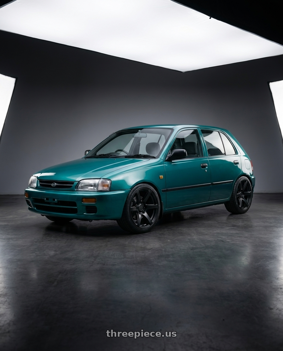 1995 Daihatsu Charade 4Door Hatchback with Enkei Cyclone 6x135 18x9+12 Matte Black wheels