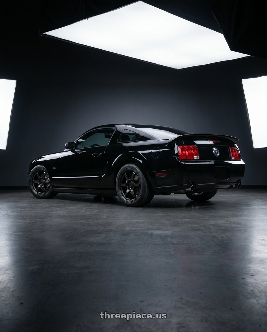 2005 ford mustang gt with Gram Lights 57DR 5x114.3 18x9.5+12 Semi Gloss Black wheels rear three quarter view square tires