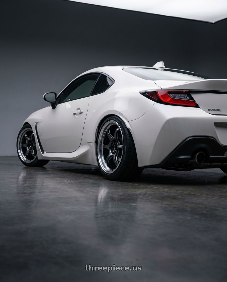 2023 subaru brz with Advan Racing RG-D2 5x100 18x8.5 +45 MACHINING & BLACK GUNMETALLIC wheels rear three quarter view slight stretch tires