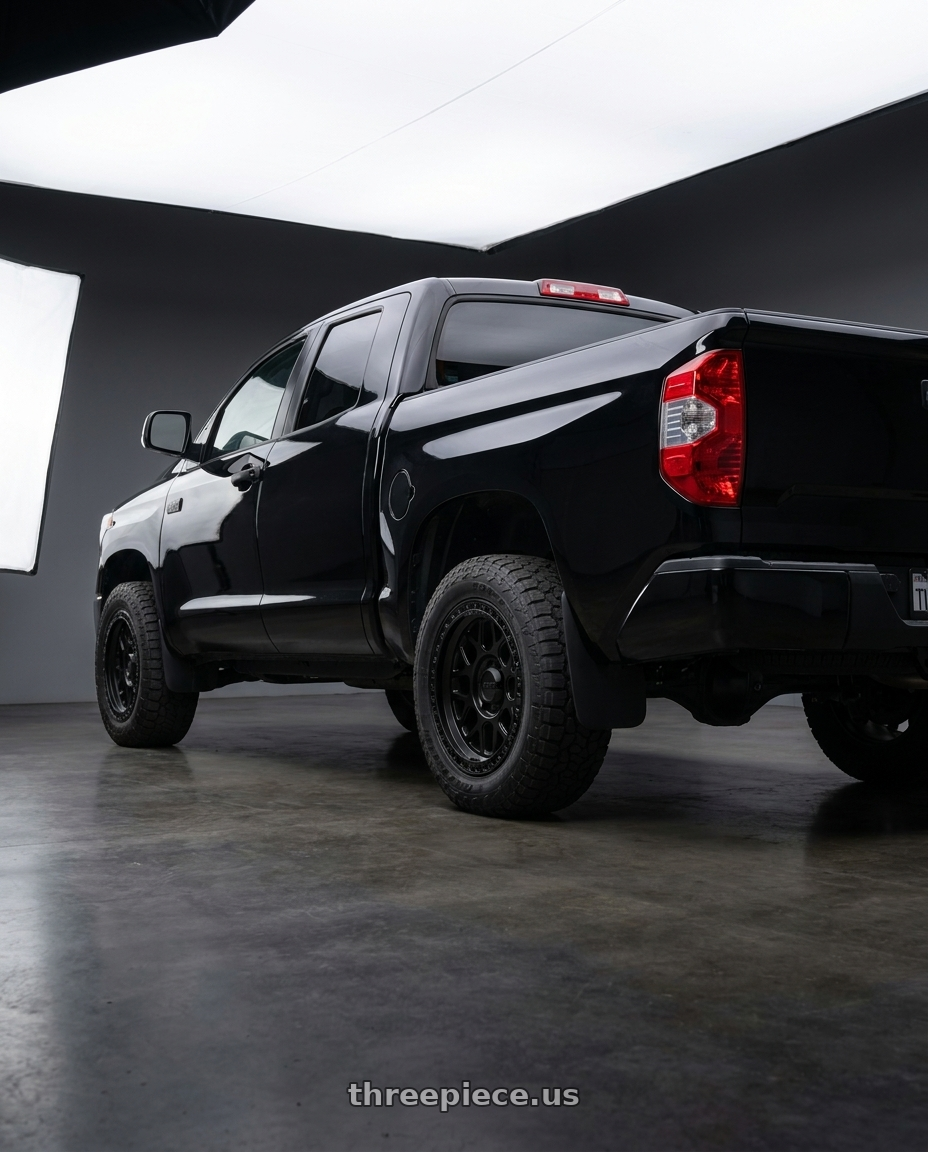 2020 Toyota tundra with KMC KM549 GRS 5X150 17X9 +18 SATIN BLACK wheels rear three quarter view square tires
