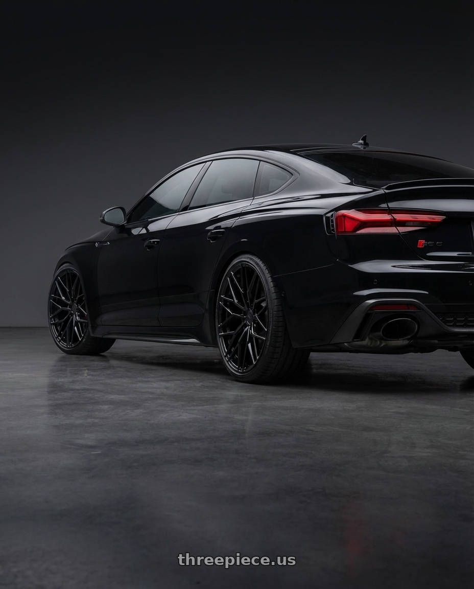 2022 Audi RS5 with Avant Garde Wheels M520R 5X112 20x10 +25 Gloss Black wheels rear three quarter view square tires