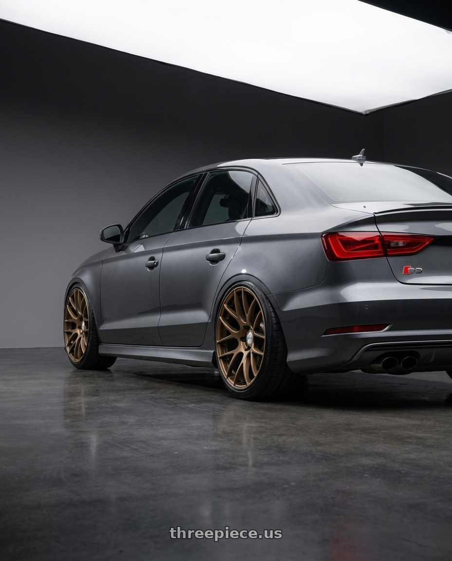 2015 Audi S3 with Work Emotion m8r 5x112 19x8.5 +30 Matte Bronze wheels rear three quarter view extreme stretch tires