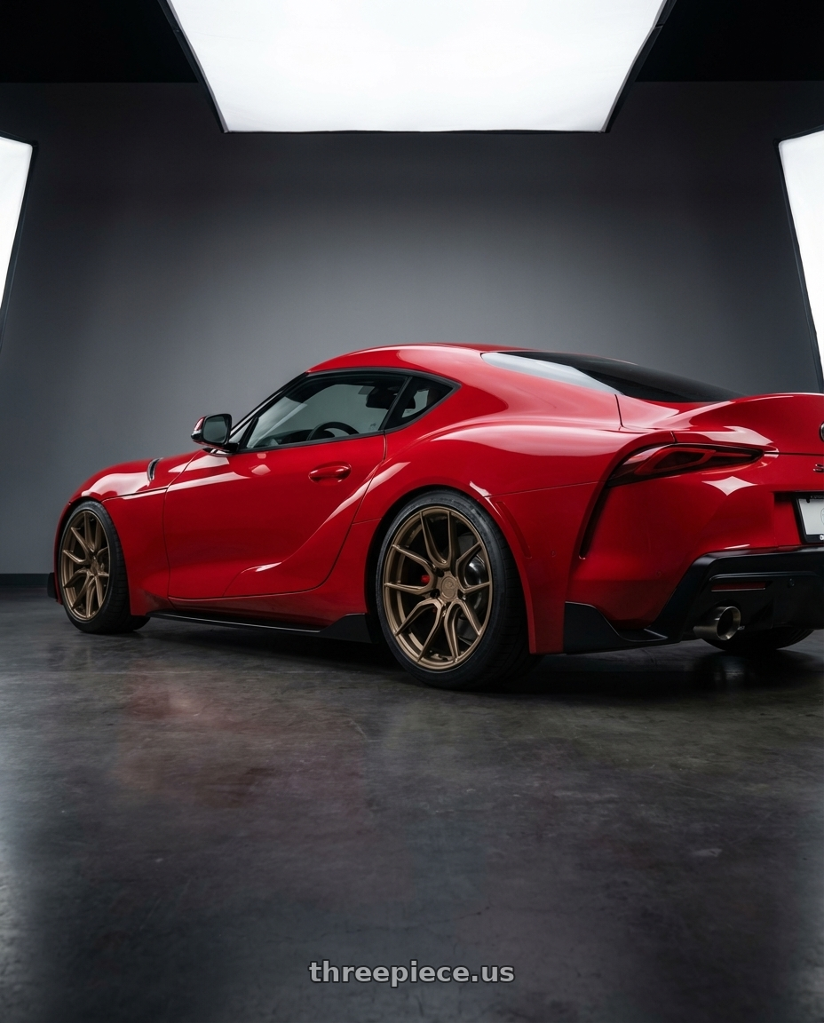 2023 Toyota GR Supra with Aodhan AFF2 5x112 19x8.5+35 Matte Bronze wheels rear three quarter view square tires