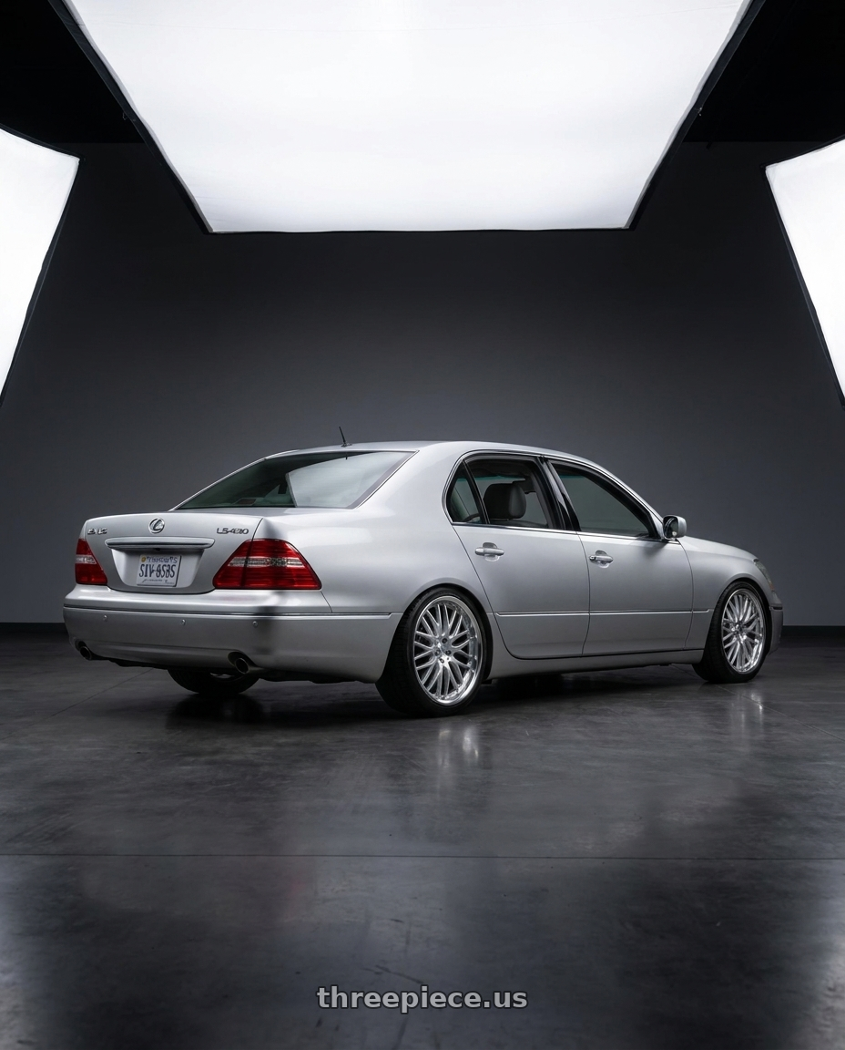 2001 Lexus LS430 with V�xx Masi 5x114.3 19x9.5+42 Silver Mirror Mach Lip wheels rear three quarter view square tires