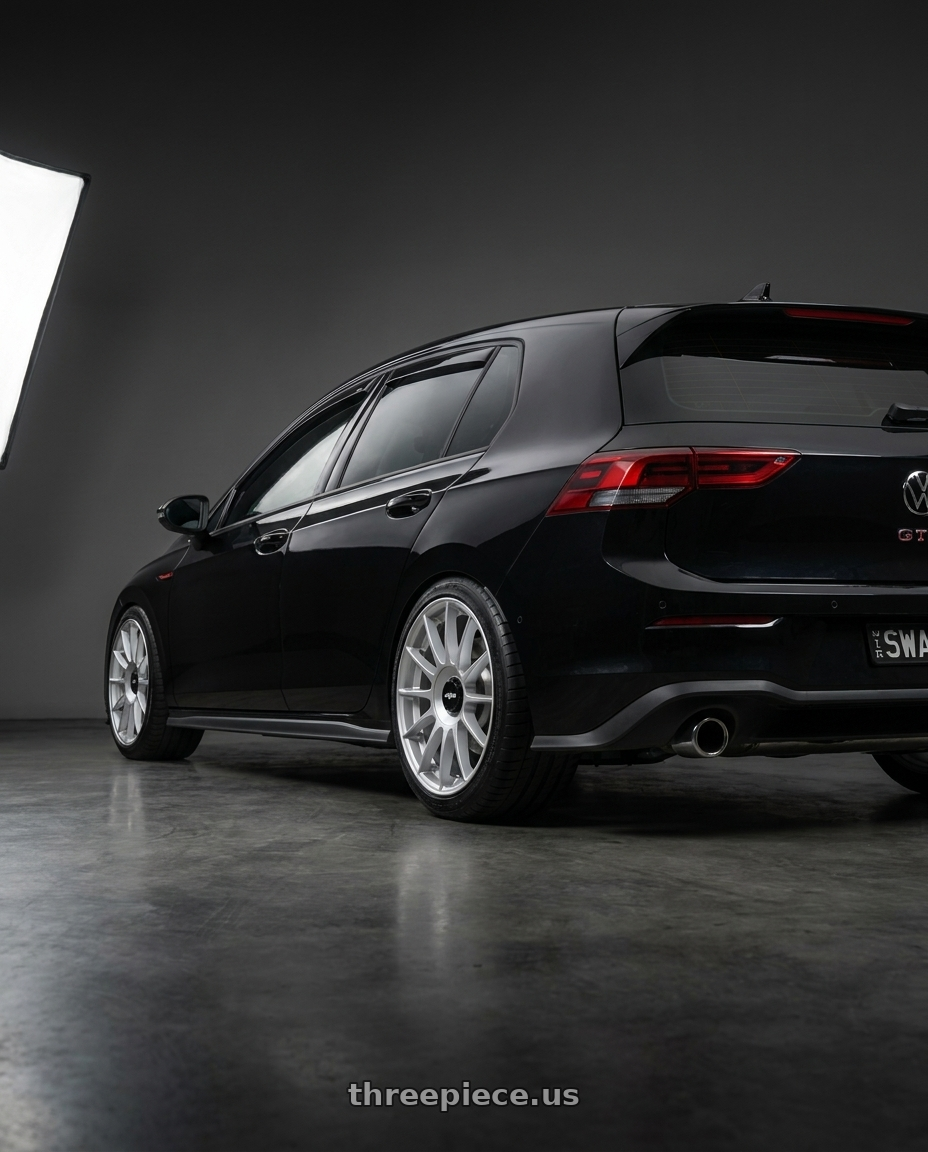 2024 Golf GTI with Rotiform 1PC R170 DTM 5X112/5X120 18X8.5 +35 SILVER wheels rear three quarter view square tires