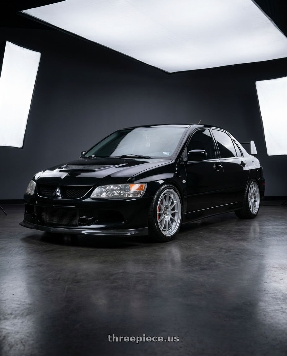 2005 Mitsubishi Lancer evolution with Enkei NT03+M 5x114.3 18x8.5+38 Silver wheels