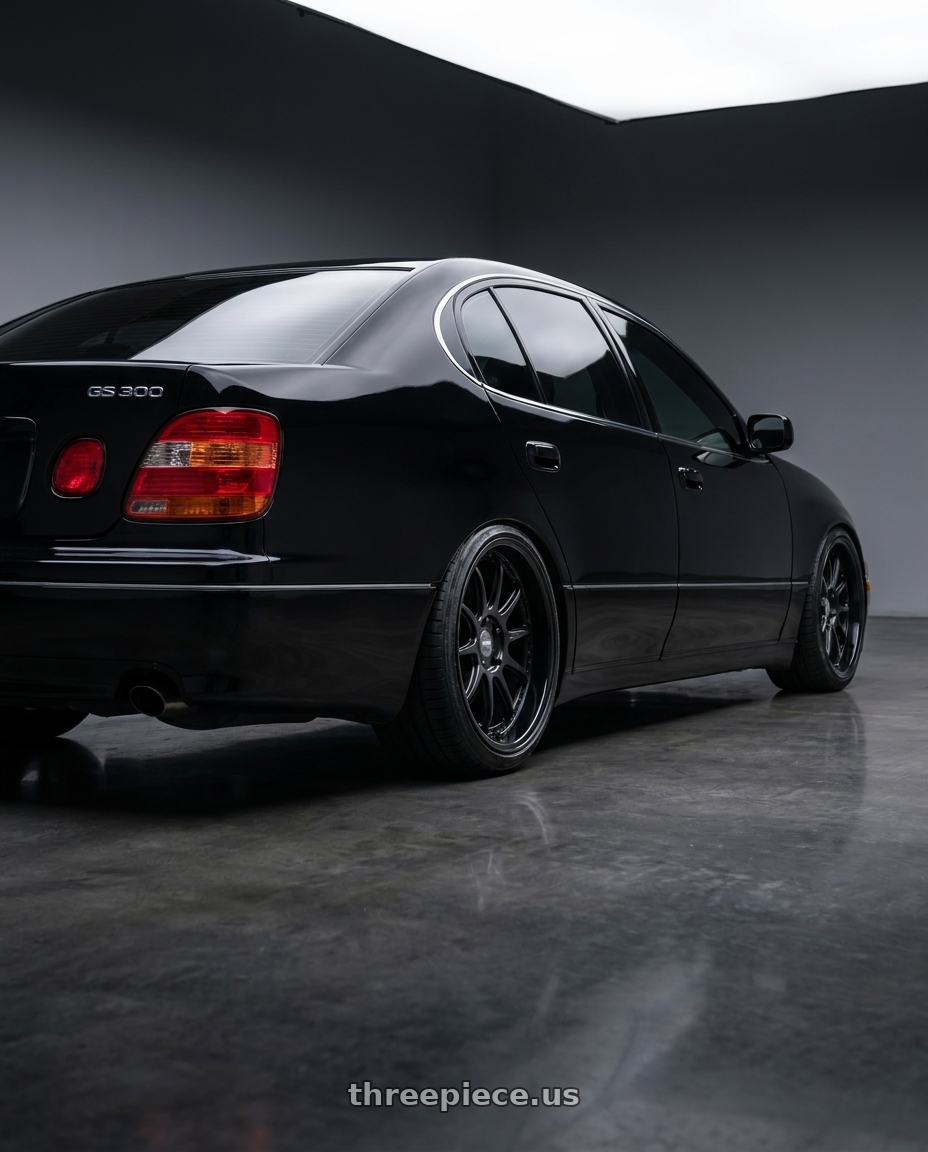 2002 Lexus gs300 with ESR Wheels CS12 5x114.3 18x8.5 +35 Matte Black wheels rear three quarter view slight stretch tires