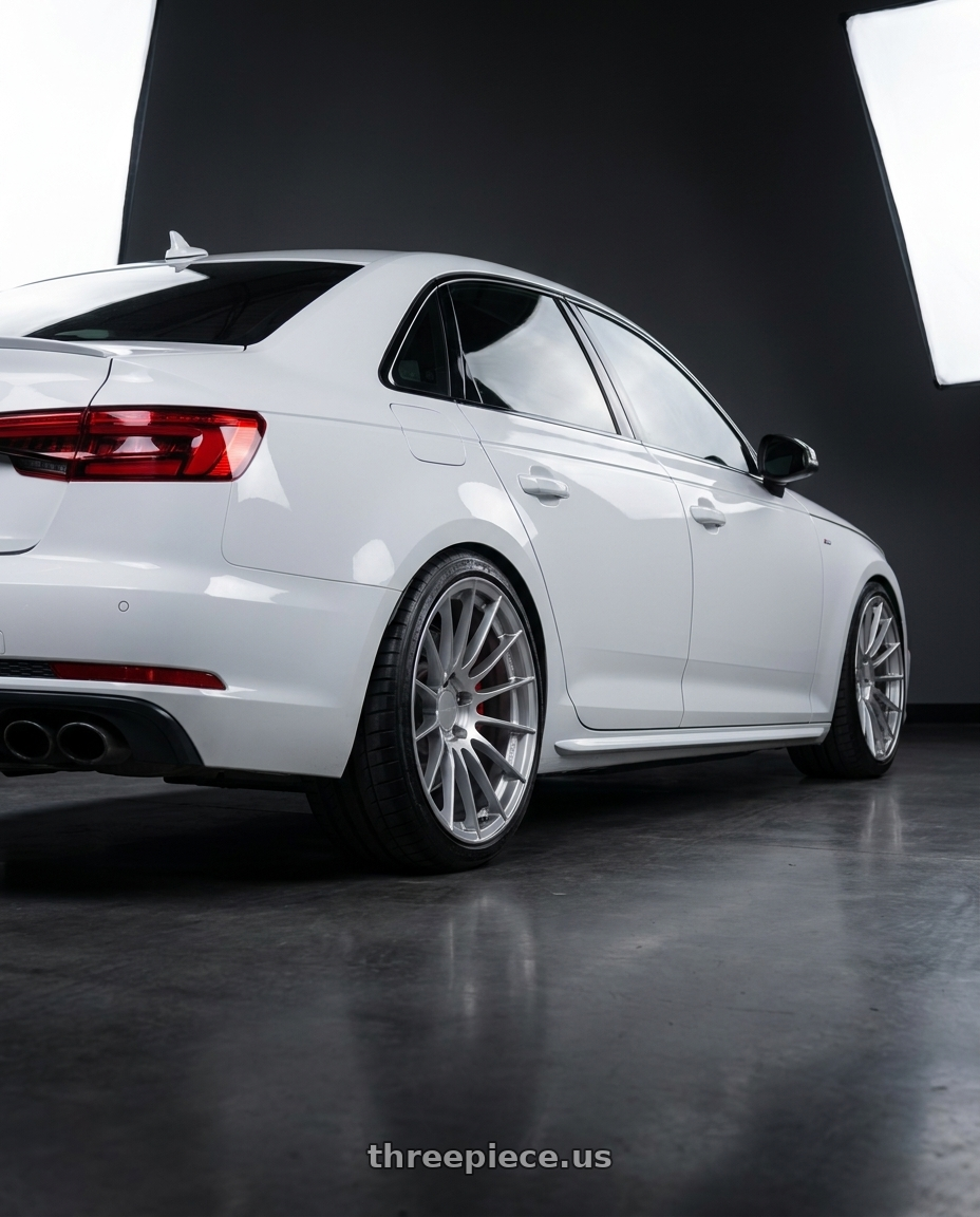 2019 Audi S4 with Enkei RS05-RR 5x114.3 18x11+16 Sparkle Silver wheels rear three quarter view slight stretch tires