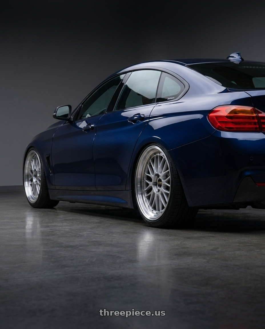 2017 F36 420i gran coupe with BBS LM 5x120 20x9.0+15 Diamond Silver wheels rear three quarter view slight stretch tires