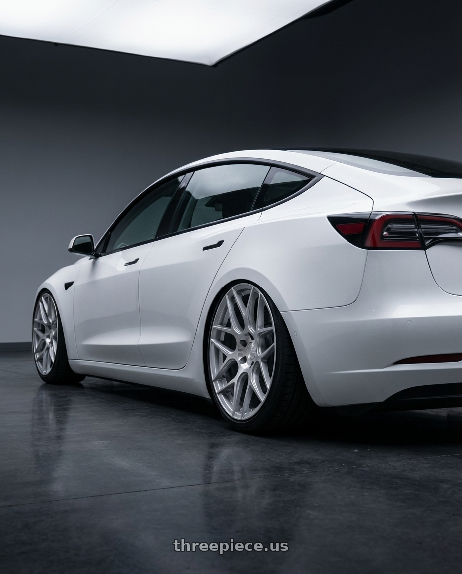 2023 Tesla Model 3 with Aodhan AFF2 5x114.3 19x9.5+35 Gloss Silver Machined Face wheels rear three quarter view slight stretch tires