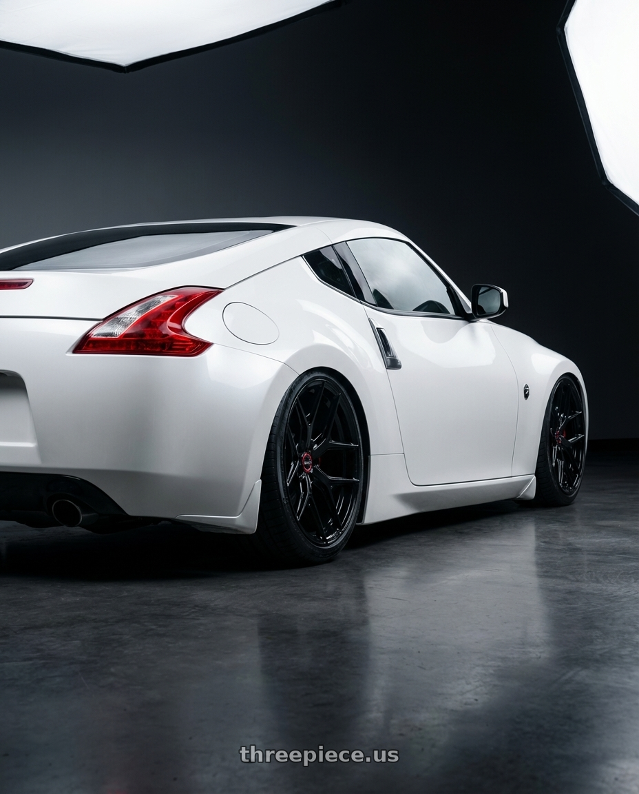 2019 Nissan 370Z with Vossen HF-5 19x9.5 / 5x114.3 / ET40 / Deep Face / 73.1 - Gloss Black Wheel - HF5-9N63 wheels rear three quarter view slight stretch tires
