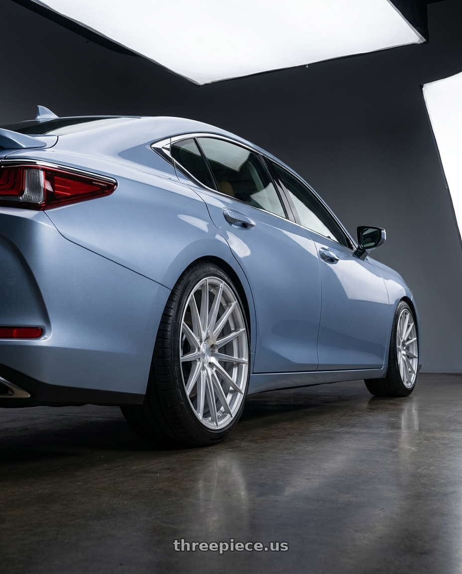 2027 LEXUS ES500e with Avant Garde Wheels M615 5X112 19x9.5 +48 Silver Machine wheels rear three quarter view slight stretch tires