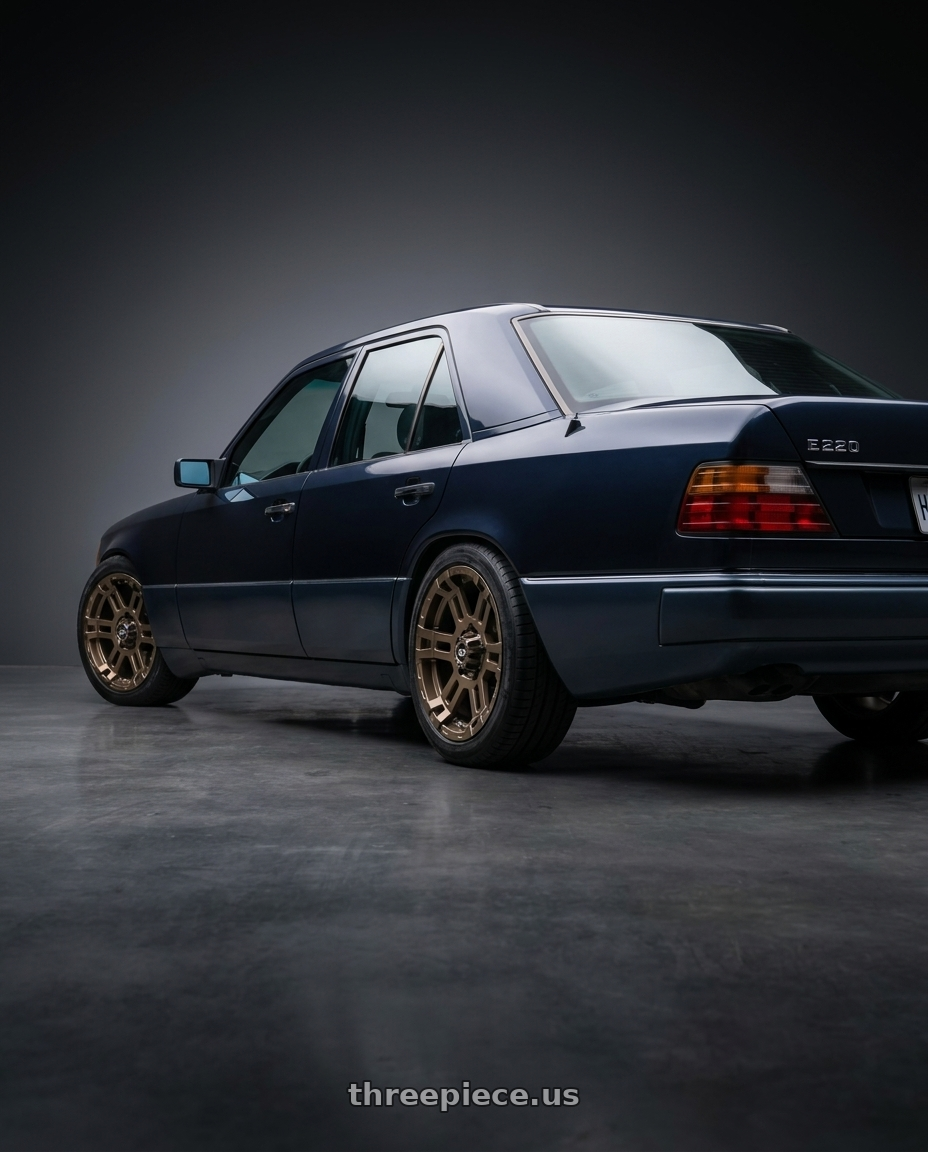 1993 Mercedes Benz E220 with Enkei Commander 6x139.7 18x8.5+10 Bronze wheels rear three quarter view square tires